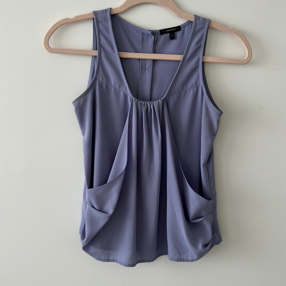 Silk light, purple sleeveless top that buttons down in the back